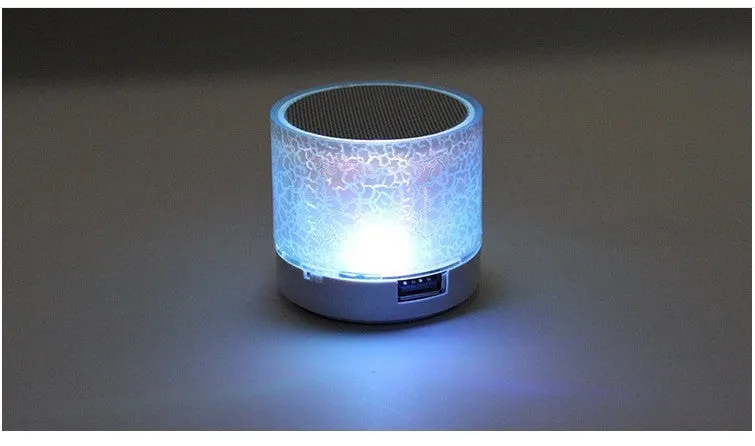 Mini portable card Bluetooth speaker in white with waterproof plastic shell, radio and MP3 support