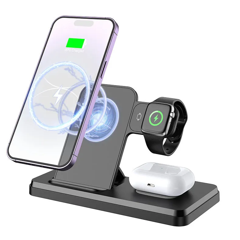 Folding bracket three-in-one wireless charger in black charging an iPhone, Apple Watch, and AirPods on a desk