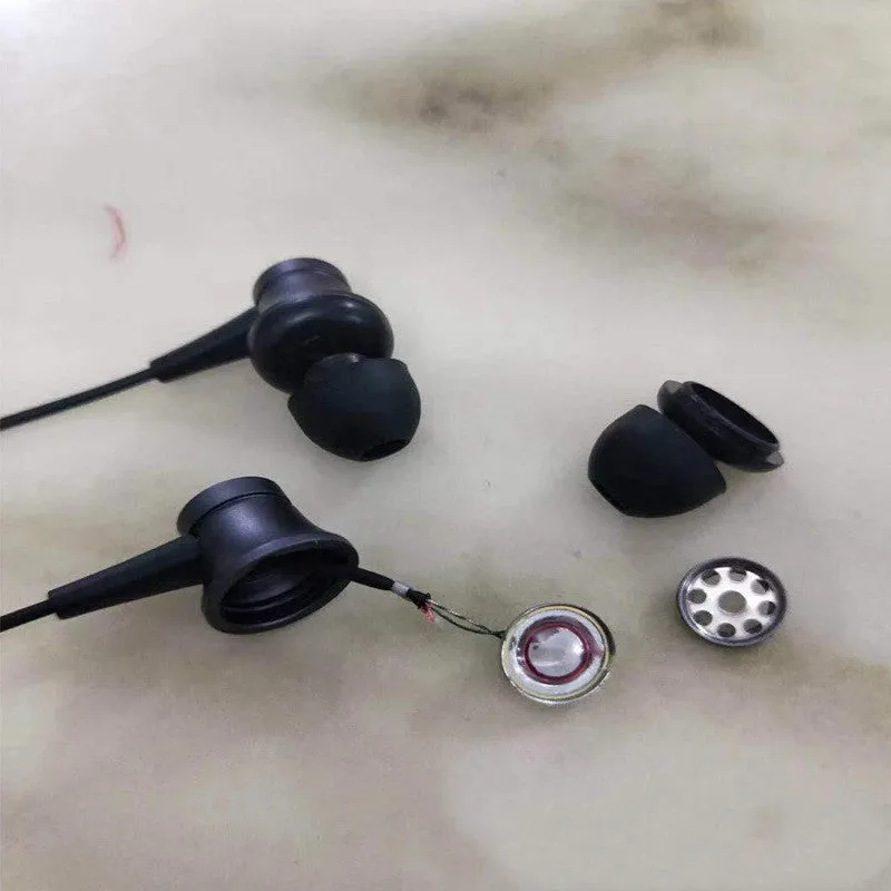 Piston style wired in-ear headphones with 3.5mm jack in black, blue, and red colour options.
