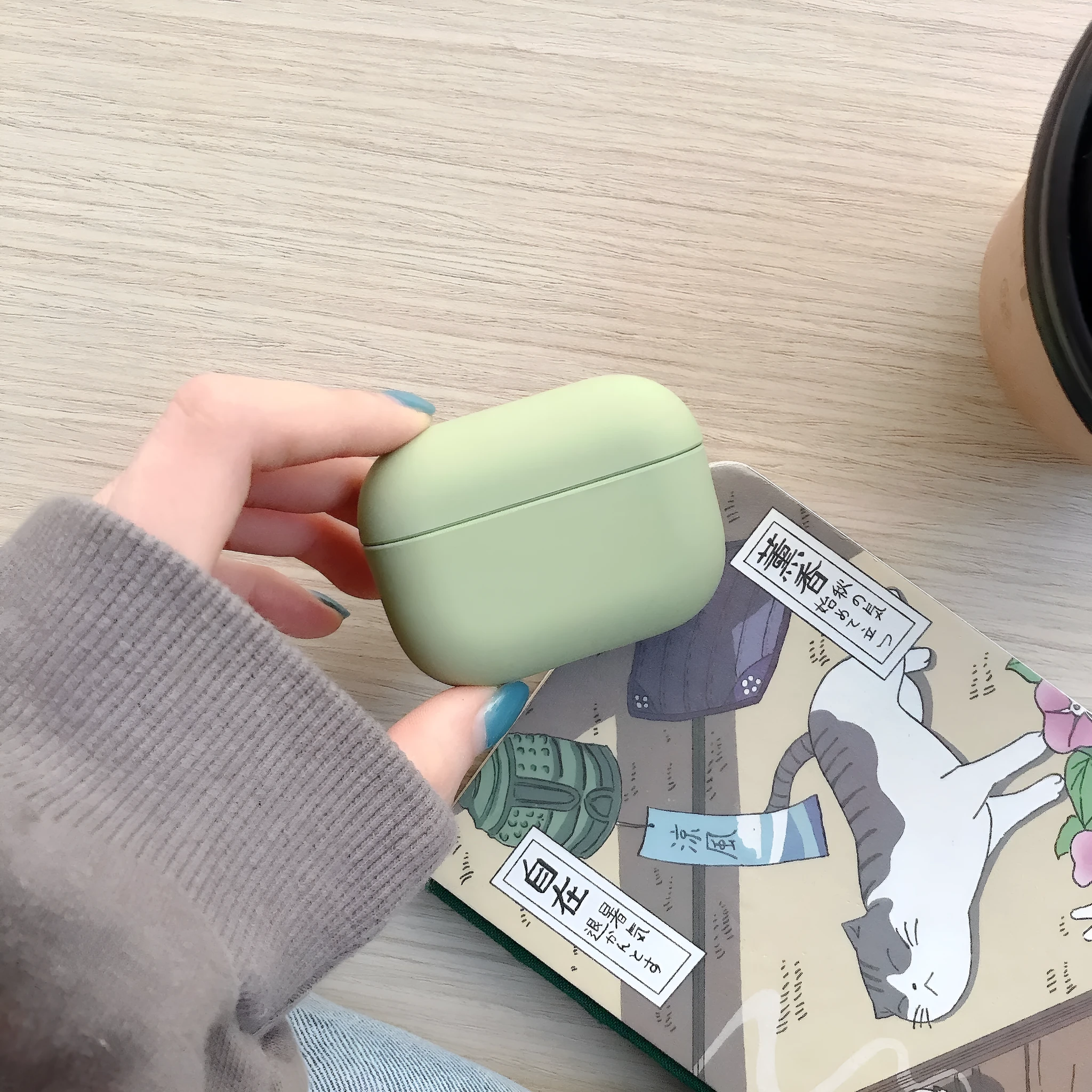 Plastic protective sleeve for AirPods case in solid colour, back-cover style with cutouts for port and lid