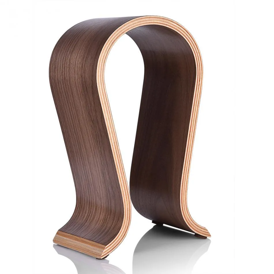 Wooden earphone holder for Bluetooth wireless headsets in brown finish on a desktop