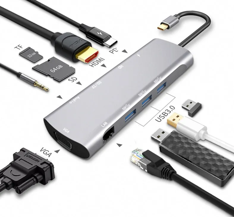 Grey aluminium USB-C docking station with multiple ports including HDMI, VGA, and USB, showing its 140mm attached cable.
