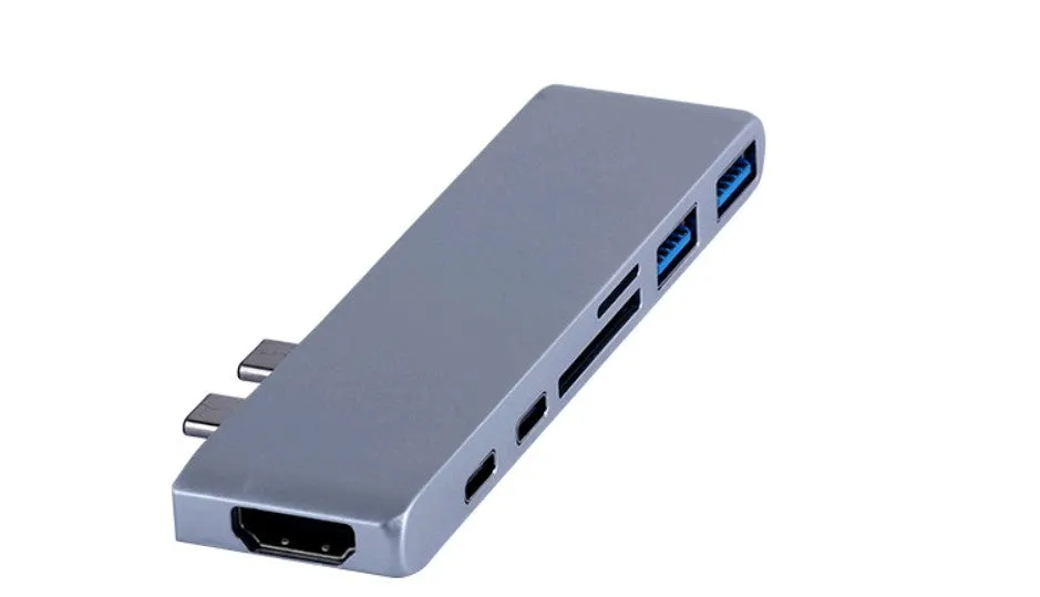 Dual Type-C seven-in-one hub in aluminium-magnesium alloy with HDMI and USB ports, 12.7cm long