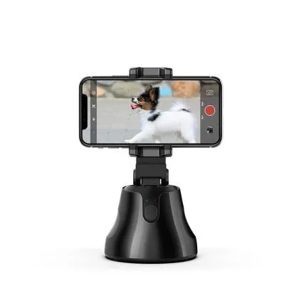 Black smartphone automatic shooting selfie stick with 360° face tracking on three-foot bracket showing phone holder and rotation mechanism