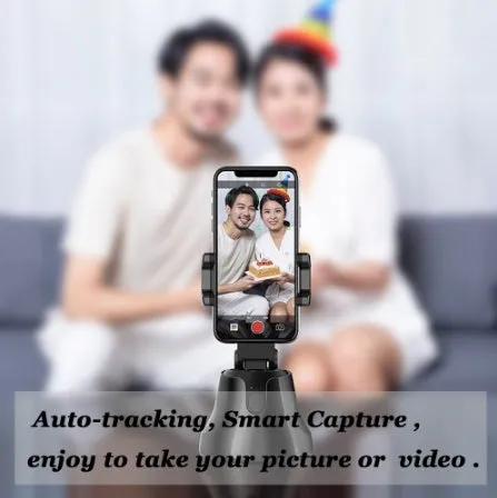 Black smartphone automatic shooting selfie stick with 360° face tracking on three-foot bracket showing phone holder and rotation mechanism