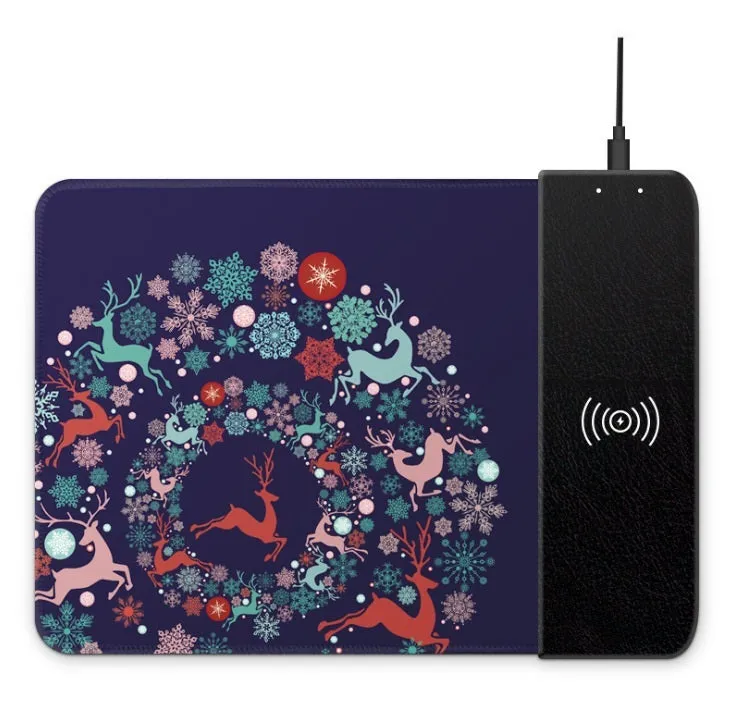 Black wireless charging mouse pad with RGB lighting edge and a cartoon design, shown on a desk.