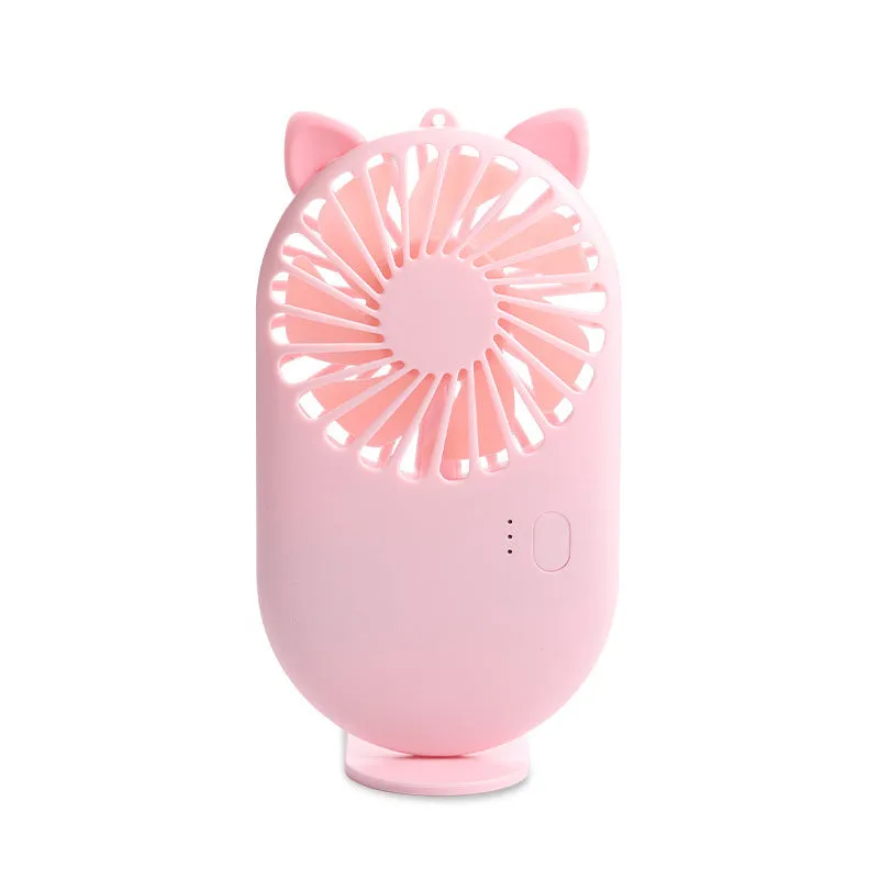 Blue portable USB rechargeable mini fan with three speed modes on a desk, plastic blade and piano switch visible