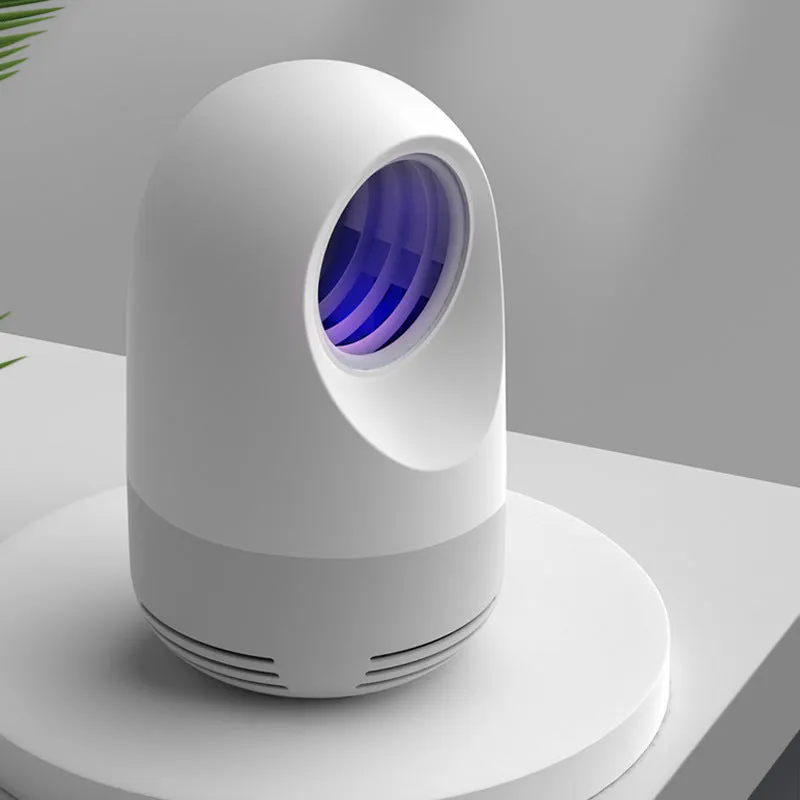 Photocatalyst mosquito killer lamp with bionic UV light and USB cable on desktop