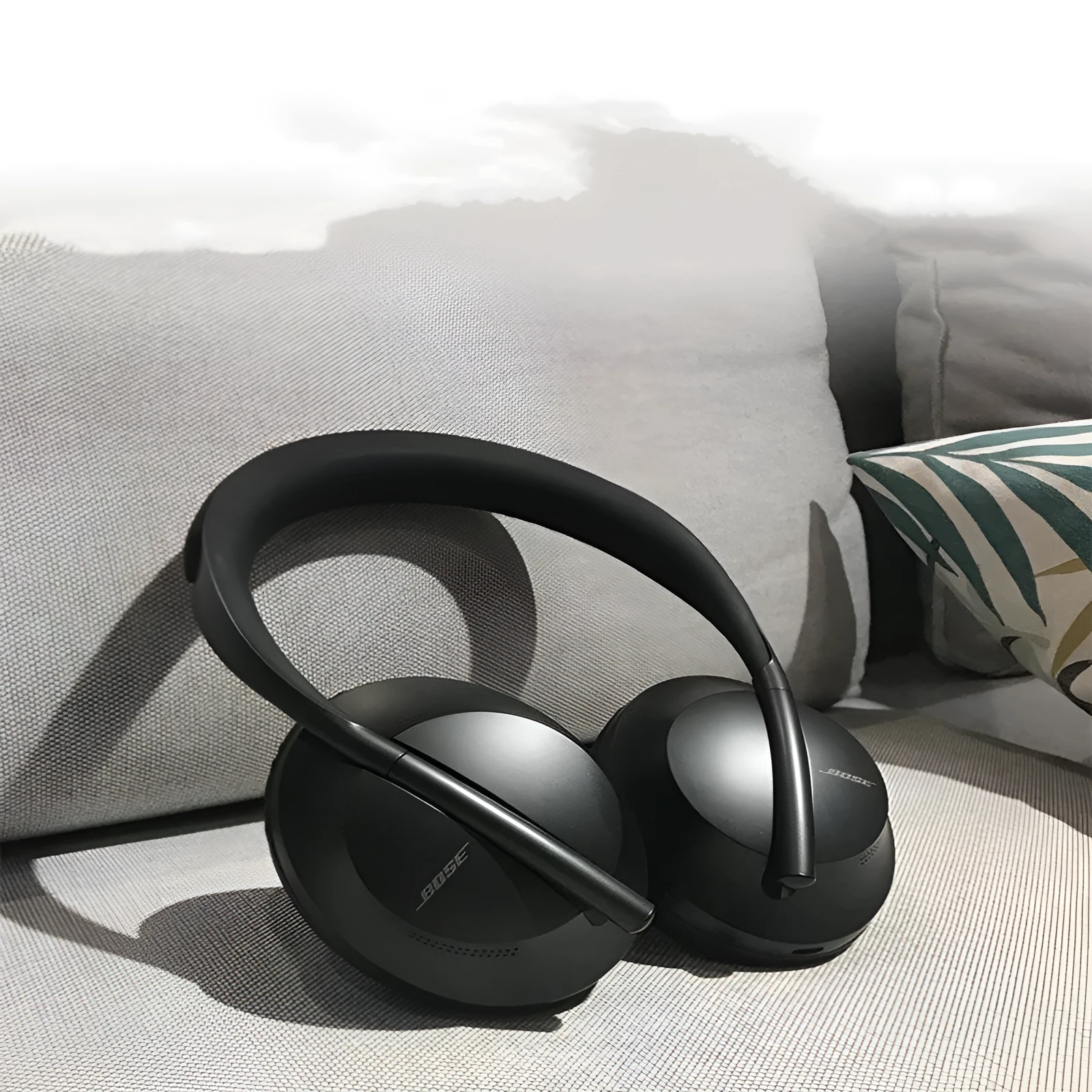 Wireless noise reduction bluetooth headset in Black with cushioned ear pads and adjustable headband