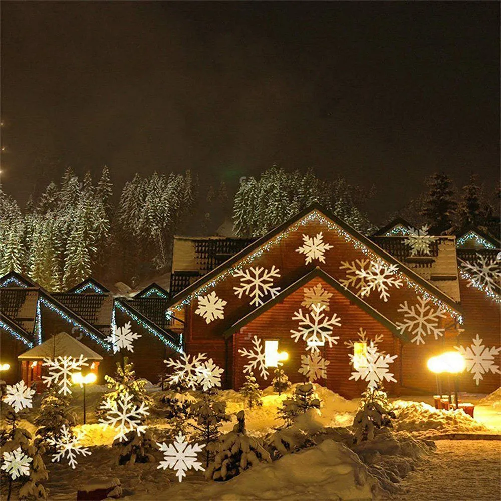 Garden Snow Lamp solar LED snowflake light with red, green, and blue multicolour glow placed in a garden lawn