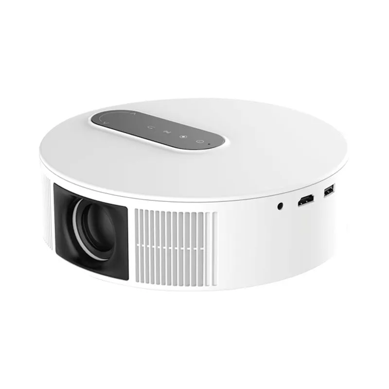 White HD home projector with remote control on table for bedroom cinema setup