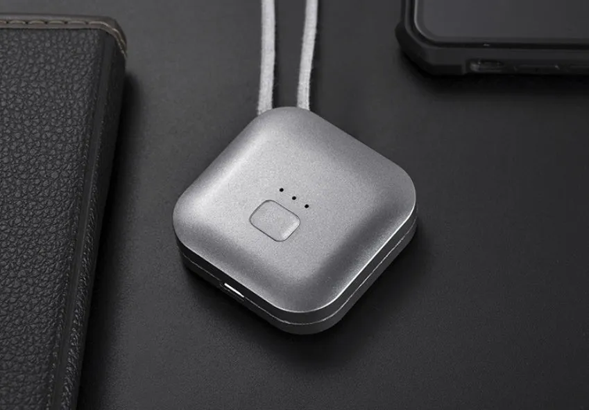 Mini USB portable air purifier necklace in blue, shown worn and with USB cable.