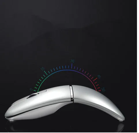 Crystal silver dual-mode Bluetooth wireless mouse with foldable ultra-thin design on a desk