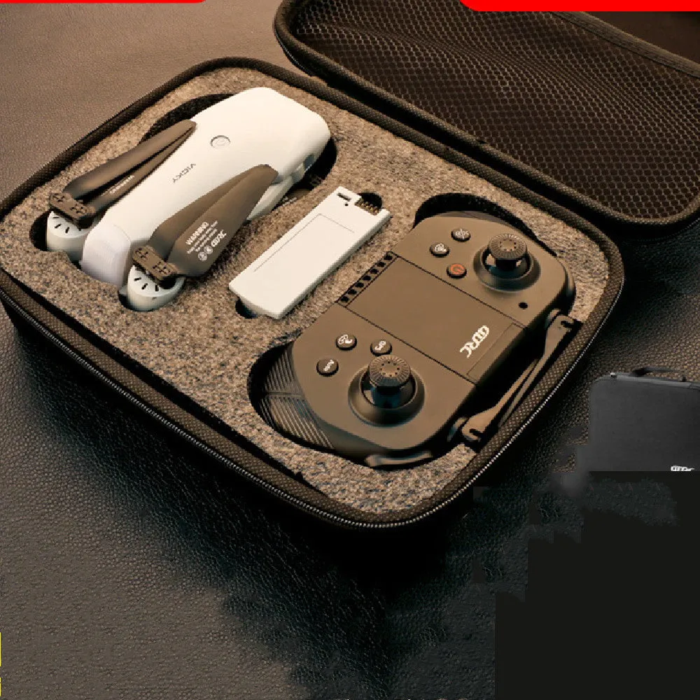 F10 folding GPS drone with 6K dual camera unfolded on a table showing propellers and camera