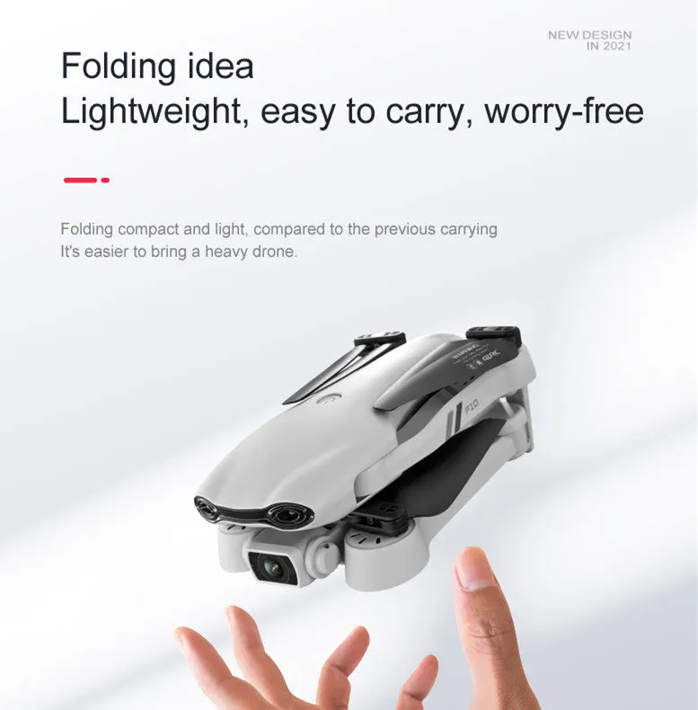 F10 folding GPS drone with 6K dual camera unfolded on a table showing propellers and camera