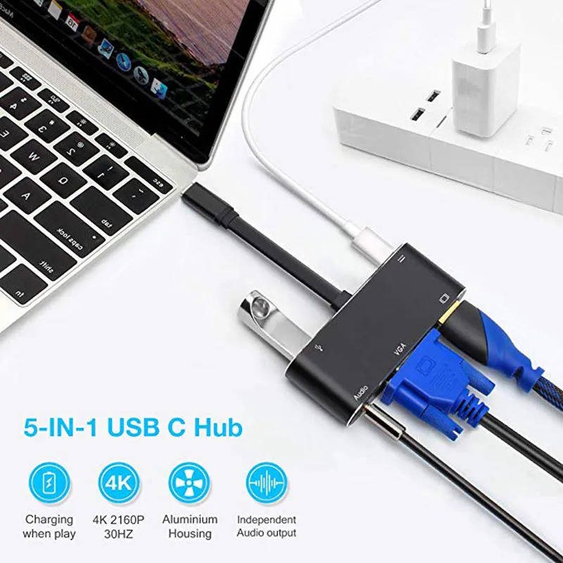 Black aluminium alloy 5-in-1 Type-C to HDMI and VGA adapter with USB and PD ports on a desk