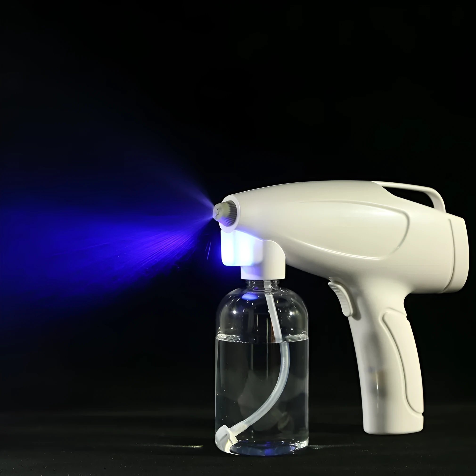 White handheld cordless electric spray gun with USB-C charging port on a plain background.