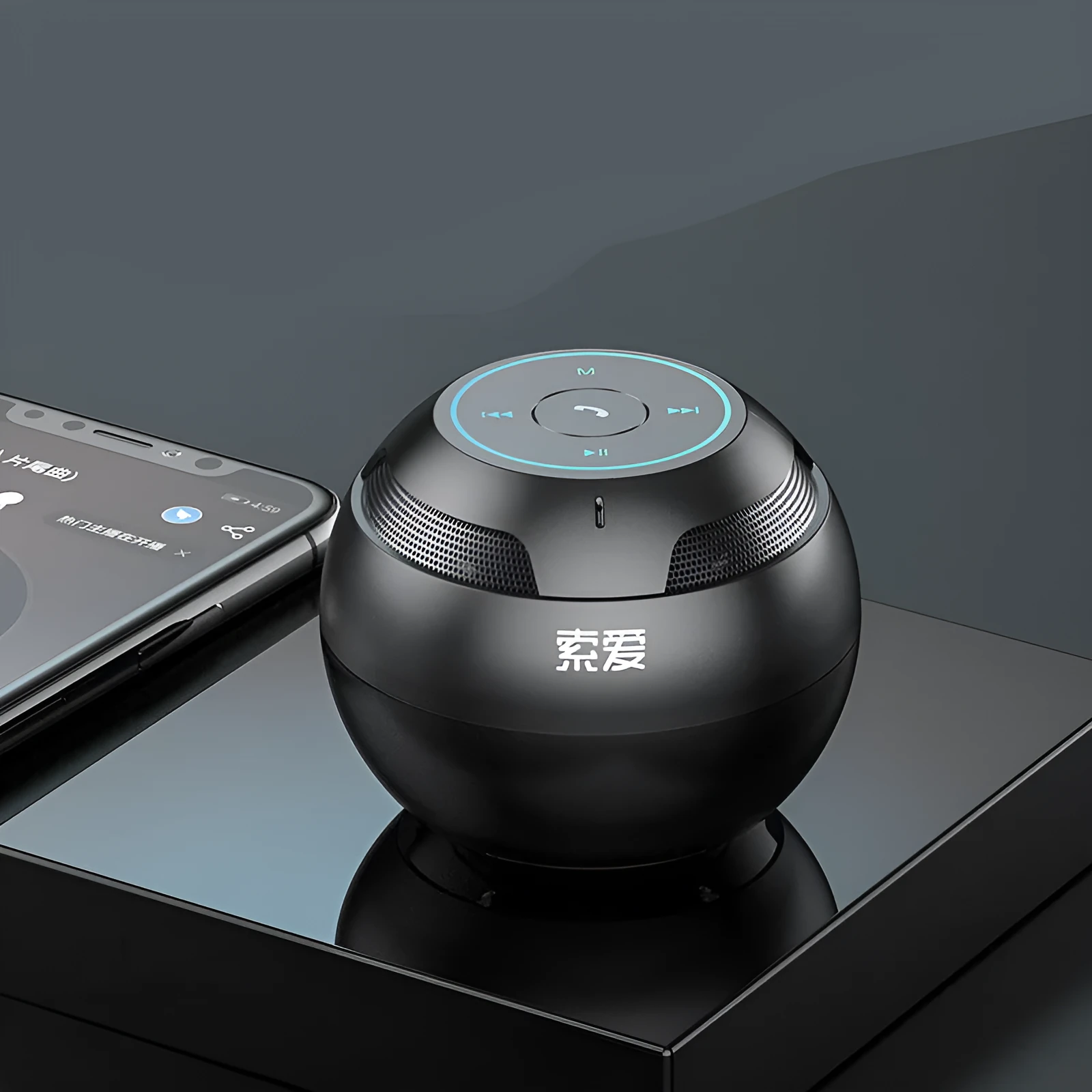 Mini portable Bluetooth speaker in black with compact 76x76x63mm plastic shell and USB port