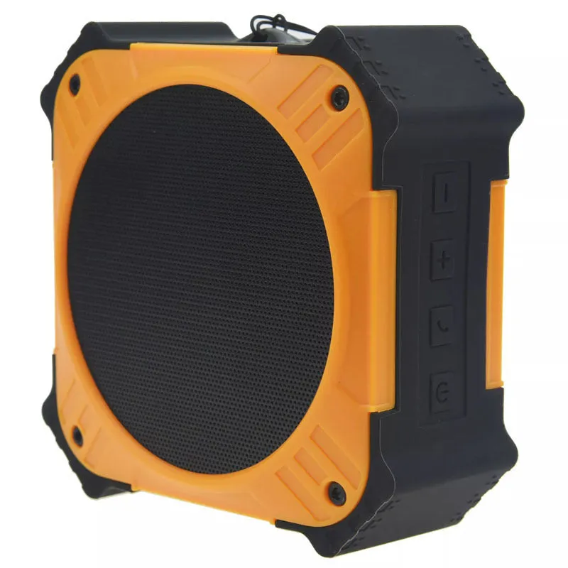 Compact black waterproof Bluetooth speaker with a wrist strap, shown next to a charging cable.