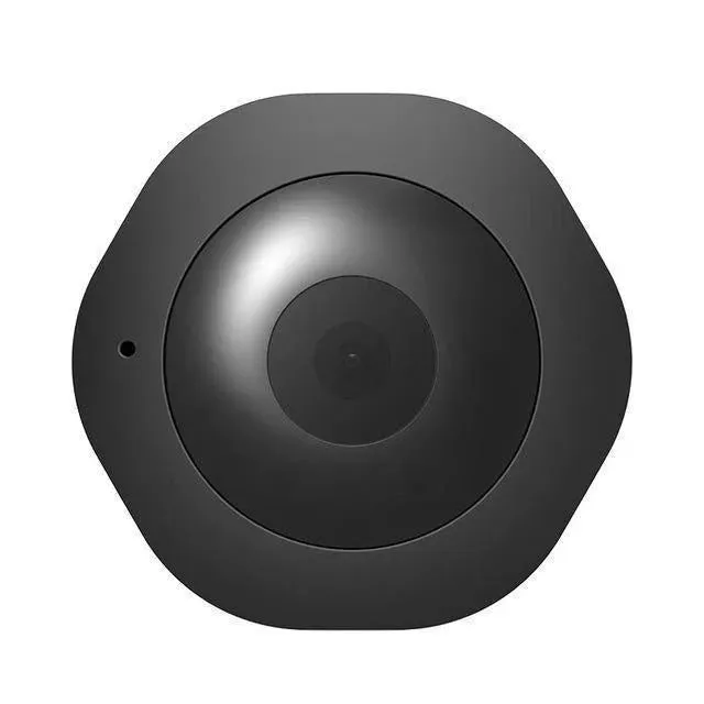 Mini round 1080P body camera with motion detection and Micro SD support, shown on a surface with magnetic pad