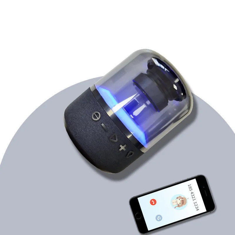 Black wireless Bluetooth speaker with touch controls and 360-degree sound projection