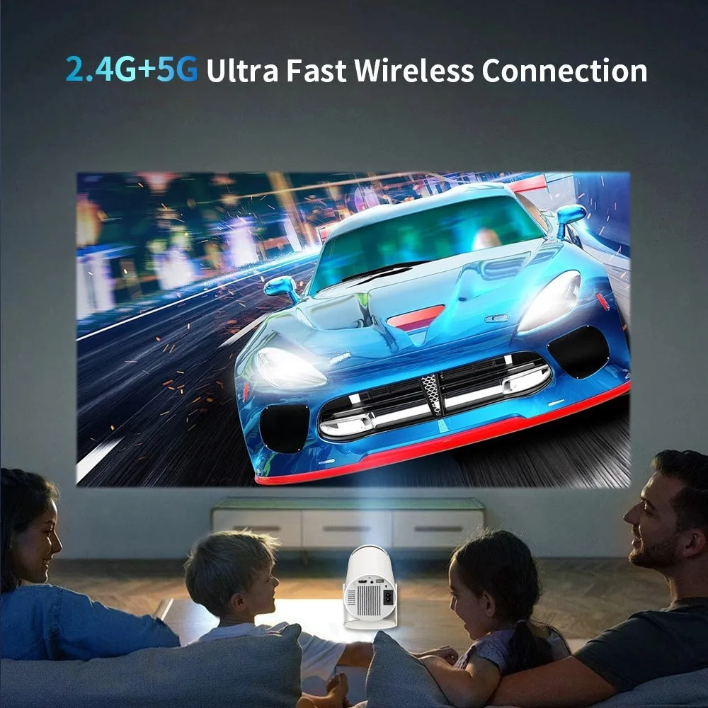 White Barrel X10 PLUS portable HD projector with remote control and gamepad on table