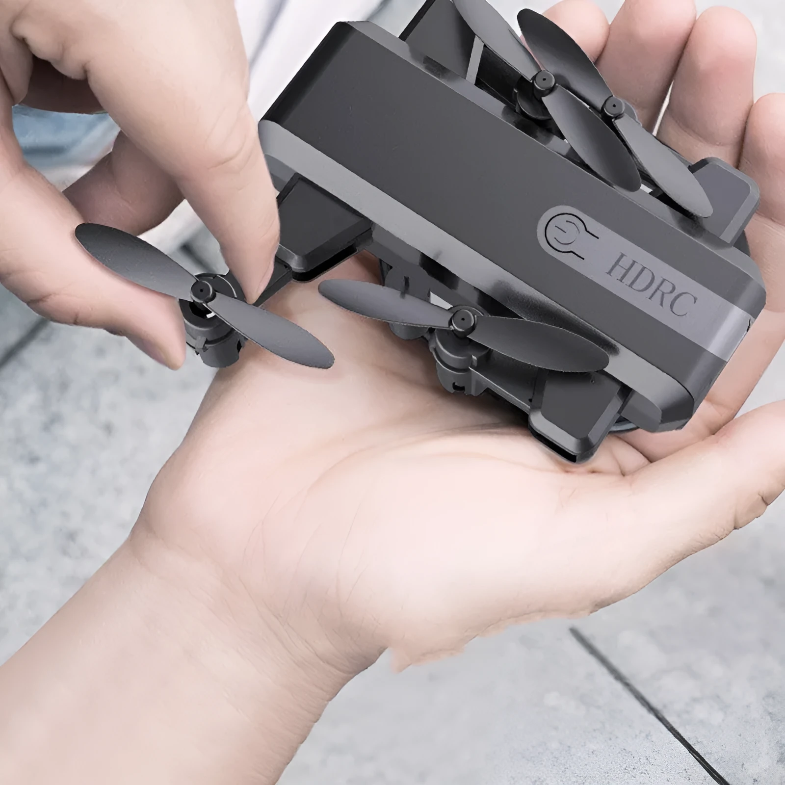 H2 mini folding drone with 2.4G remote, LED night light, foldable design, black colour, 720mAh battery
