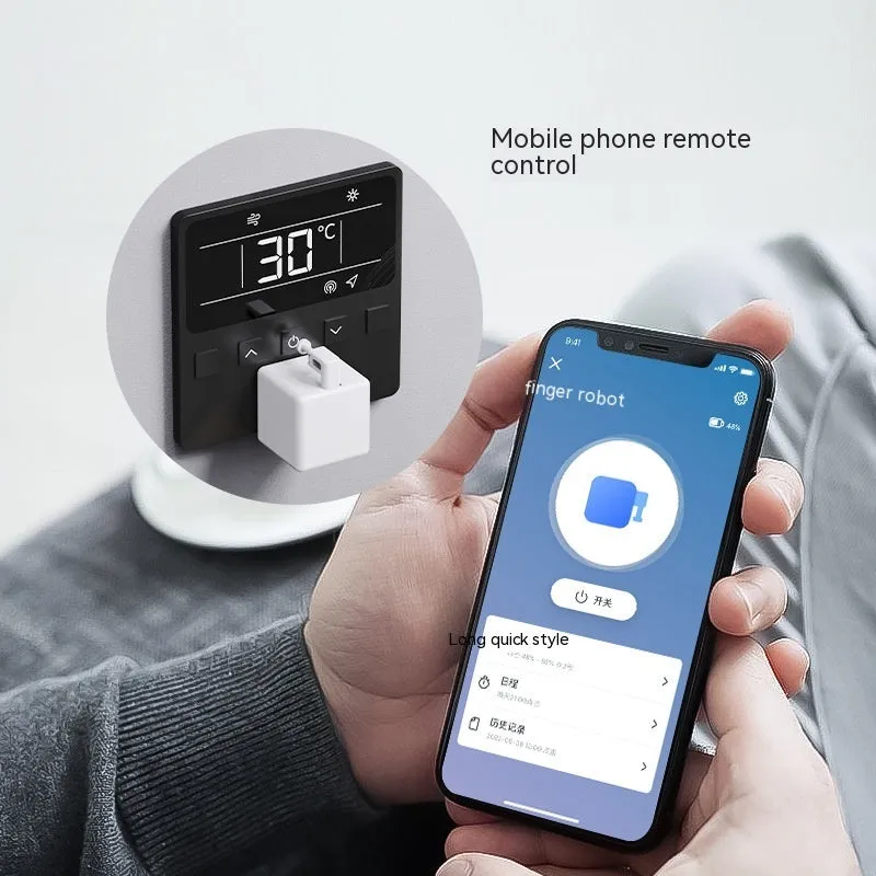 Graffiti smart home Bluetooth finger robot attached to a wall switch, white model