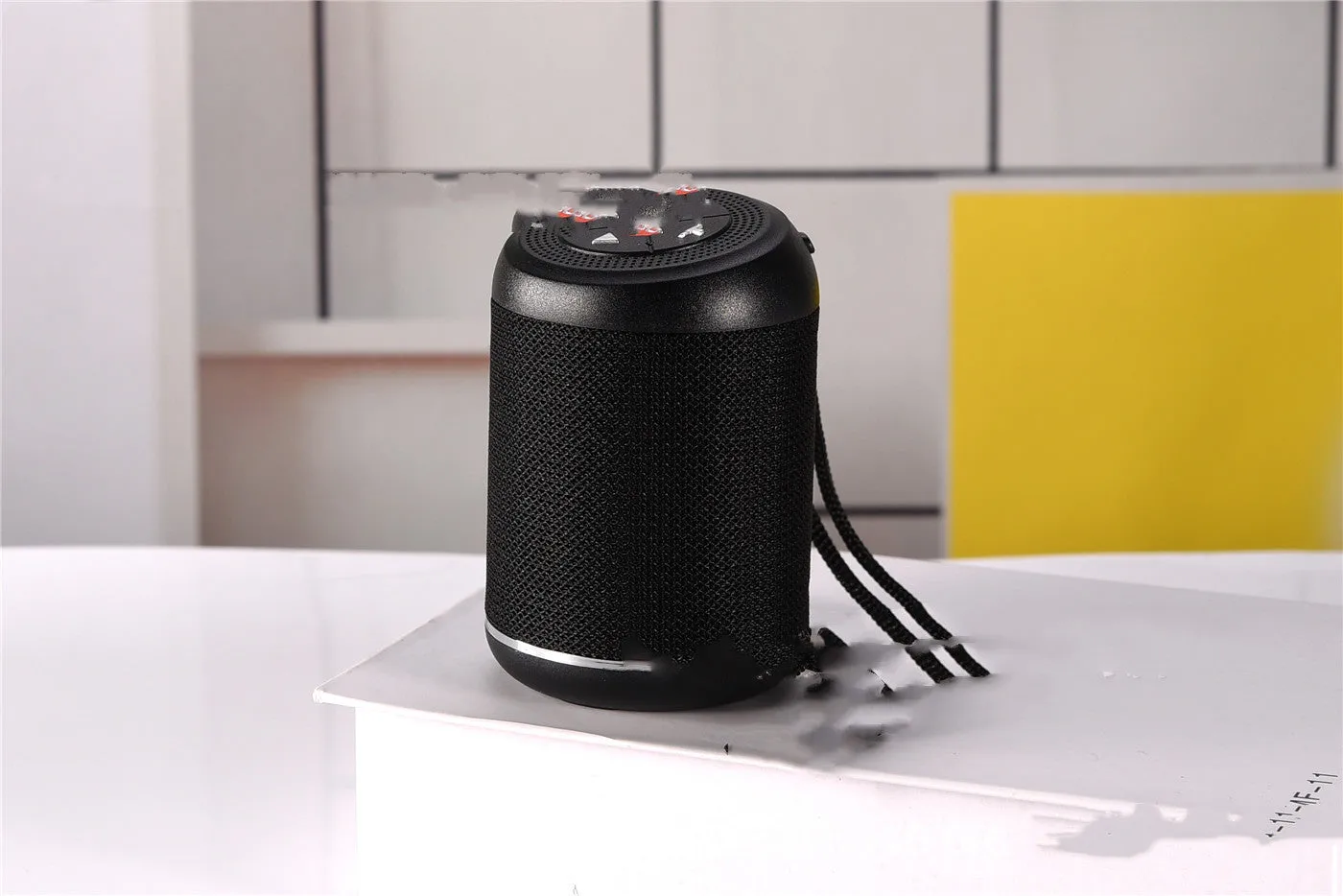 Portable outdoor Bluetooth subwoofer in multiple colours with radio, card playback, and call functions.
