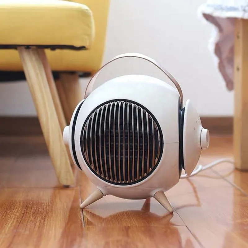 White household heater with shaking head and fine bottom fence on neutral background