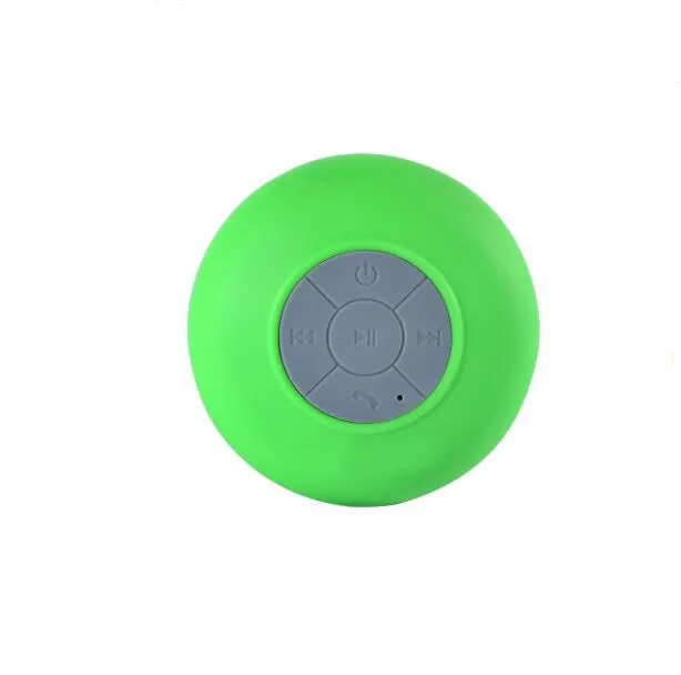 Portable Bluetooth speaker with suction cup showing front speaker grille and side buttons