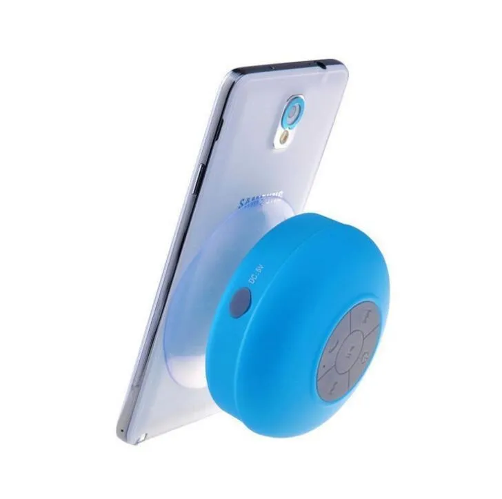 Portable Bluetooth speaker with suction cup showing front speaker grille and side buttons