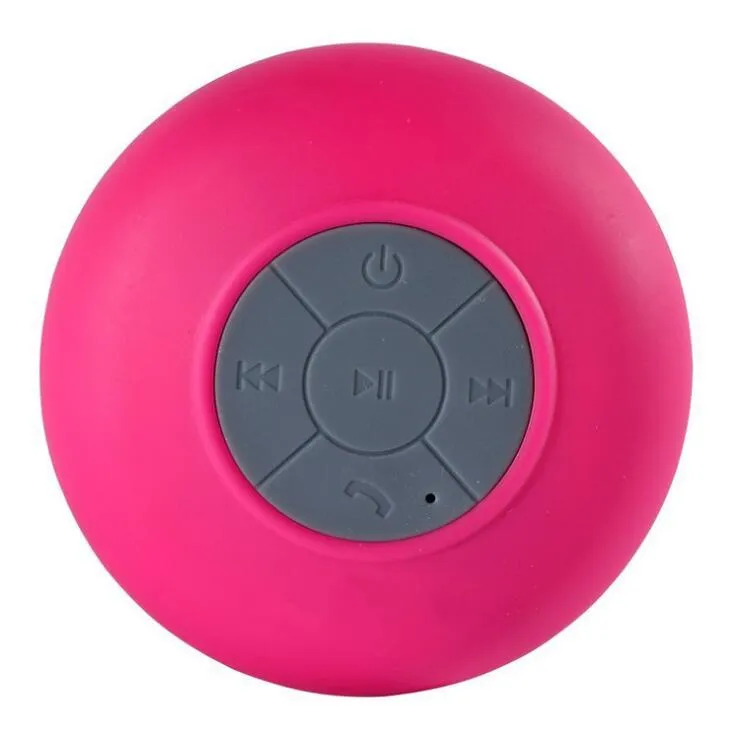 Portable Bluetooth speaker with suction cup showing front speaker grille and side buttons