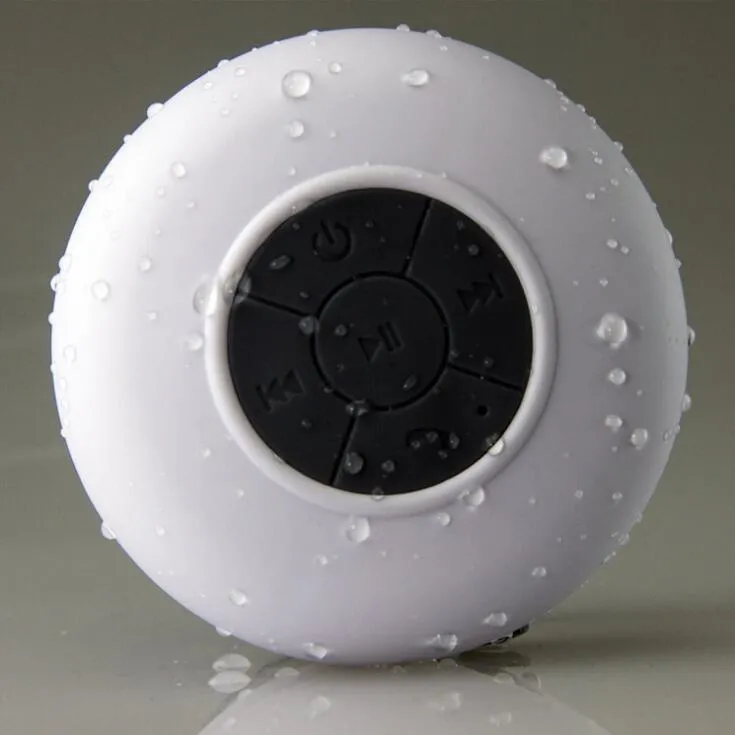 Portable Bluetooth speaker with suction cup showing front speaker grille and side buttons