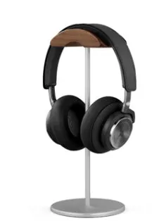 Aviation aluminium earphone holder in grey with anodized finish on a desk