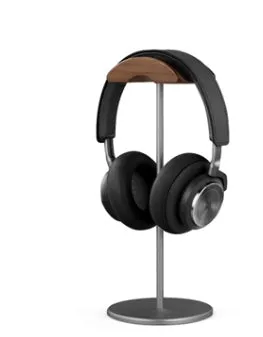 Aviation aluminium earphone holder in grey with anodized finish on a desk