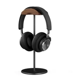 Aviation aluminium earphone holder in grey with anodized finish on a desk