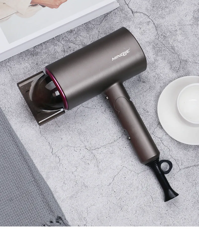 White 1600W negative ion hair dryer with concentrator nozzle and foldable handle on blue background