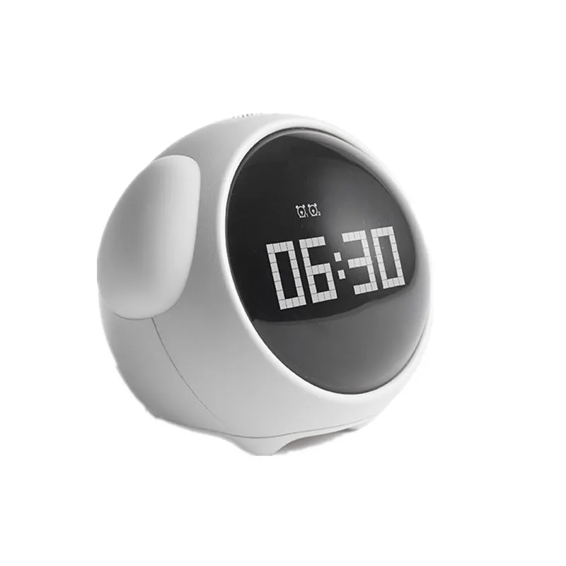 Multi-function alarm clock with pixel expression display and warm night light on a bedside table