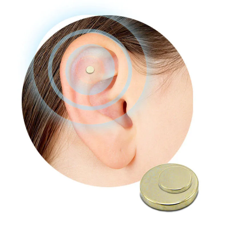 Gold quit smoking magnet earrings set with two sizes 0.5cm and 0.8cm on ear for auricular acupressure therapy