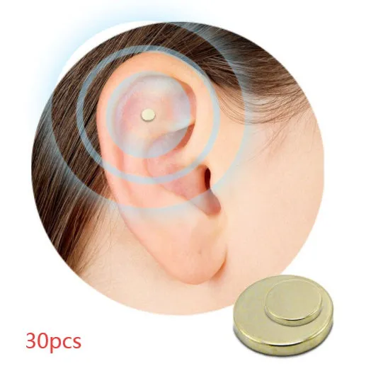 Gold quit smoking magnet earrings set with two sizes 0.5cm and 0.8cm on ear for auricular acupressure therapy