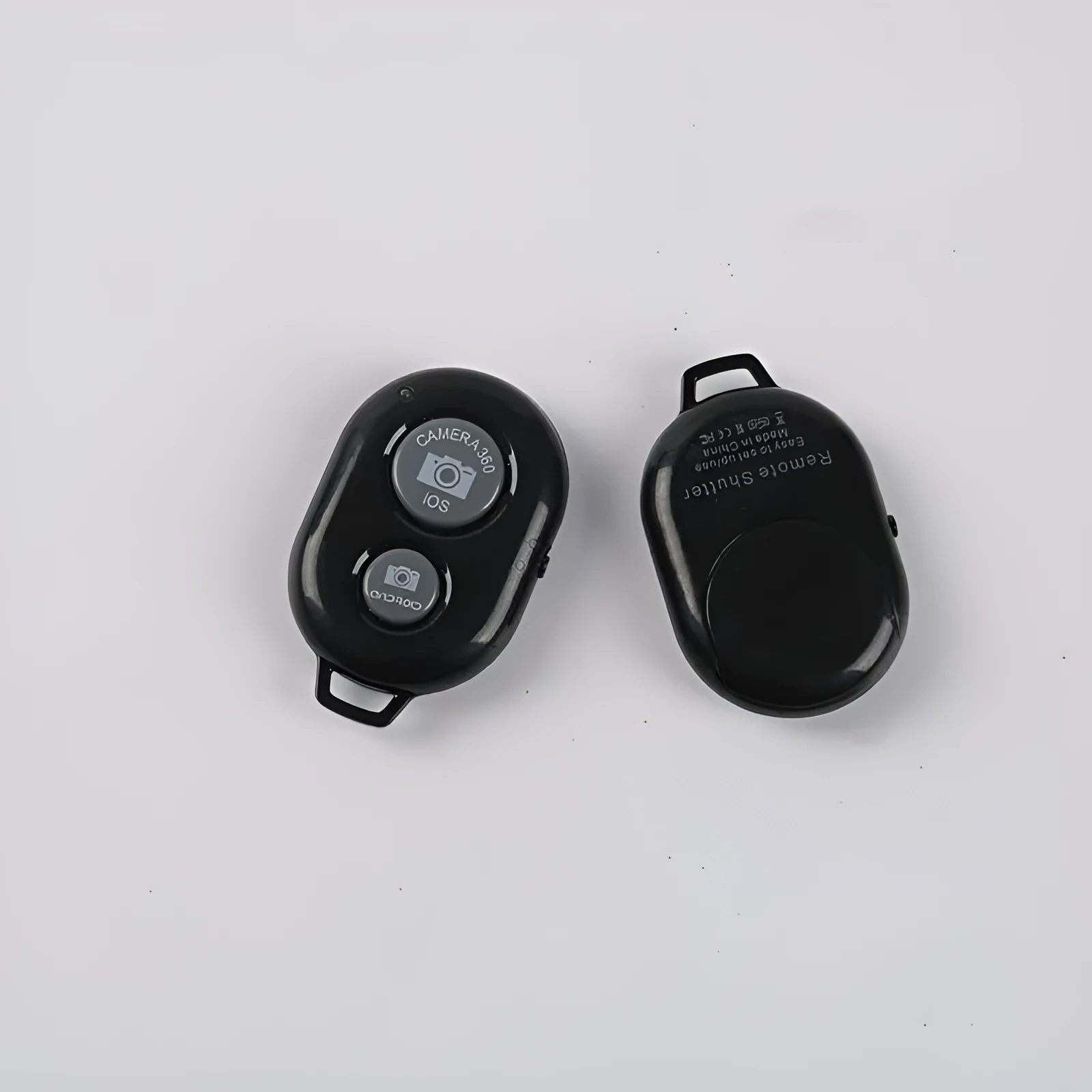 Black ABS wireless Bluetooth selfie remote shutter for mobile phone photography with 10-metre range