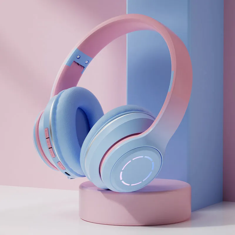 Gradient foldable wireless Bluetooth headset in blue with ear cushions and padded headband