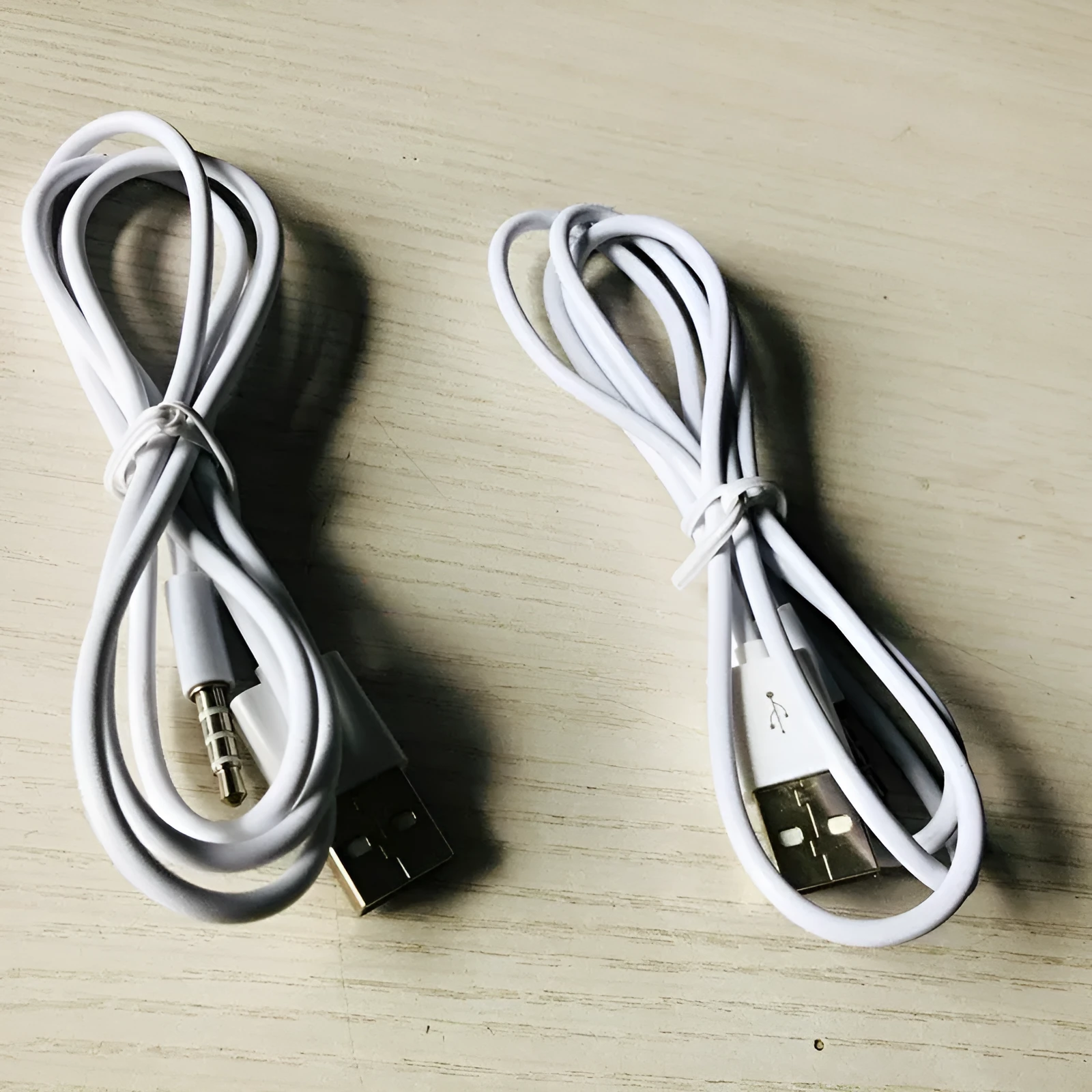 White USB male to audio adapter cable with nickel-plated connectors, 1 metre length