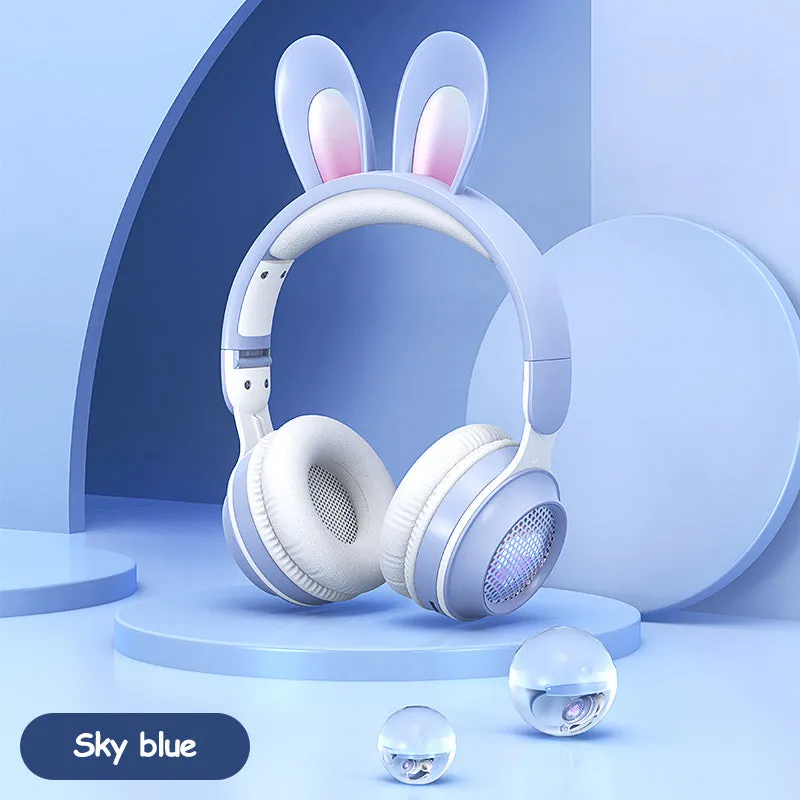 Wireless rabbit ear headphones with RGB LED ears in pink, foldable design on white background