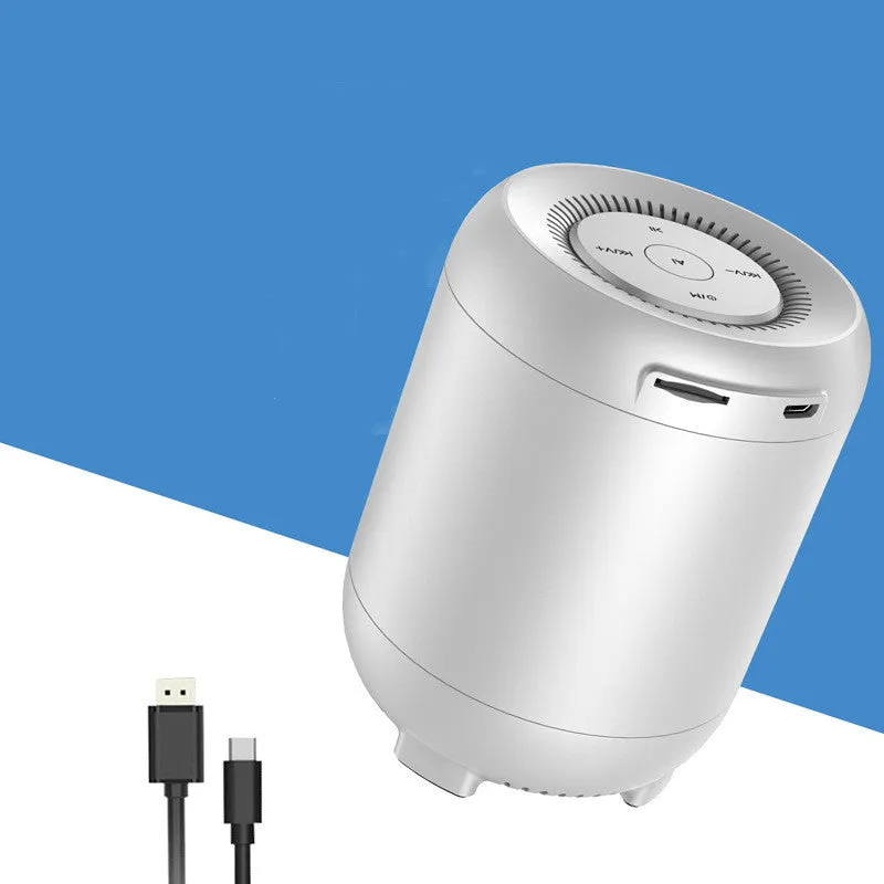 Black or white Bluetooth speaker with buttons, USB port, and AI voice control feature on Smart and Upgrade models.