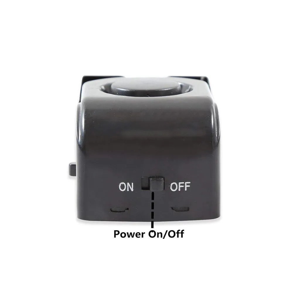 Electronic burglar alarm wedge door stop with ABS housing and 150dB siren on white background
