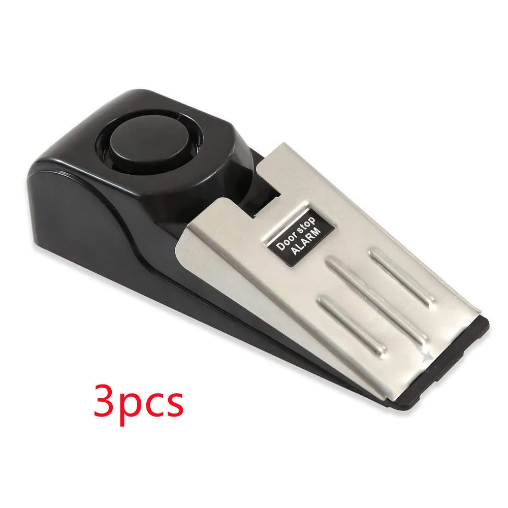 Electronic burglar alarm wedge door stop with ABS housing and 150dB siren on white background