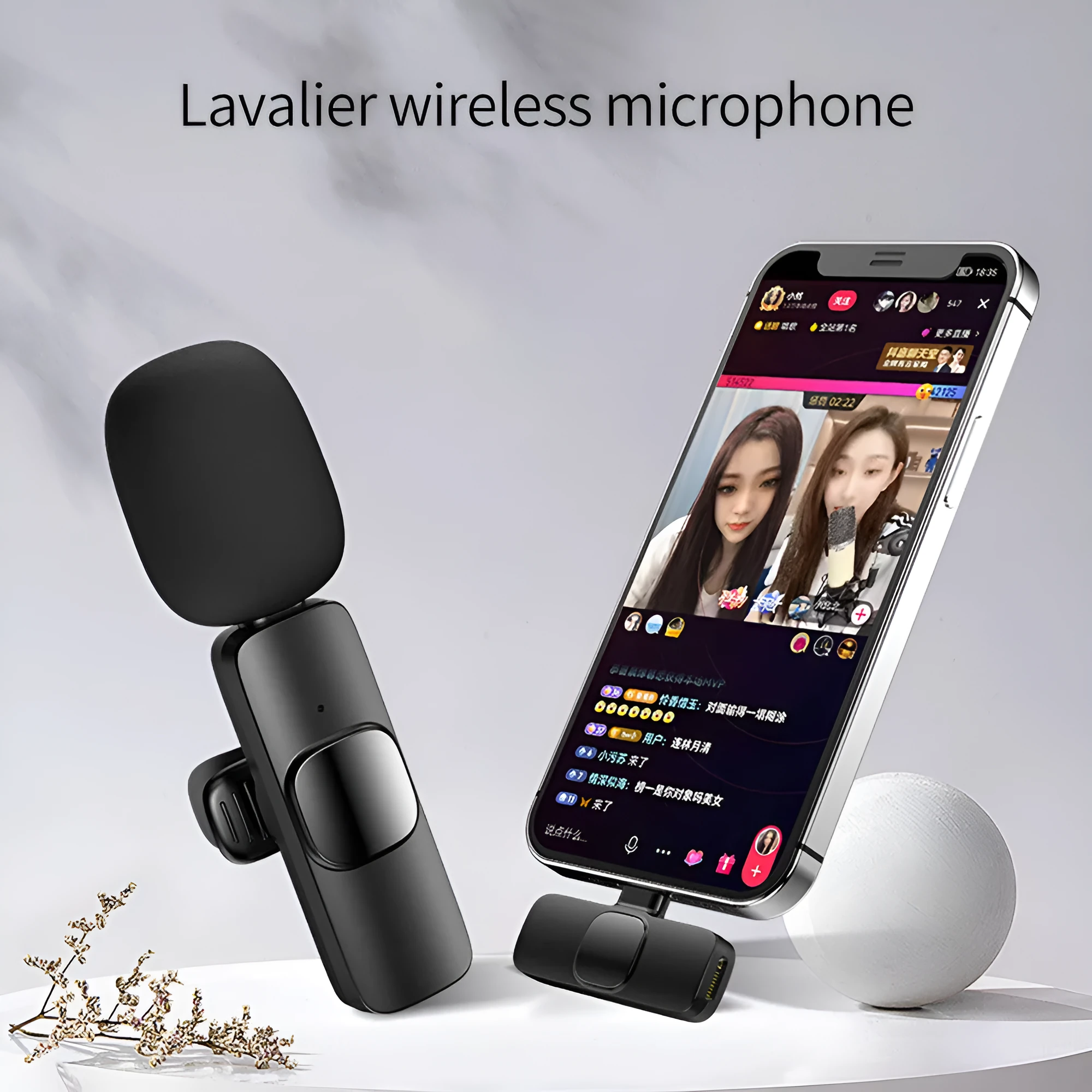 Wireless lavalier microphone with receiver, USB cable, and manual on white background