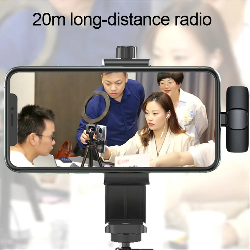 Wireless lavalier microphone with receiver, USB cable, and manual on white background